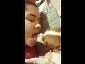 Shocking Bestiality: Woman Kisses Dog Intimately