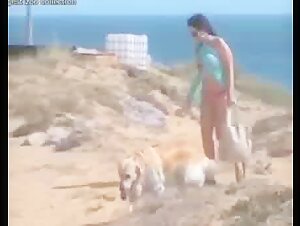 Bestiality: Woman and dog in a shocking scene